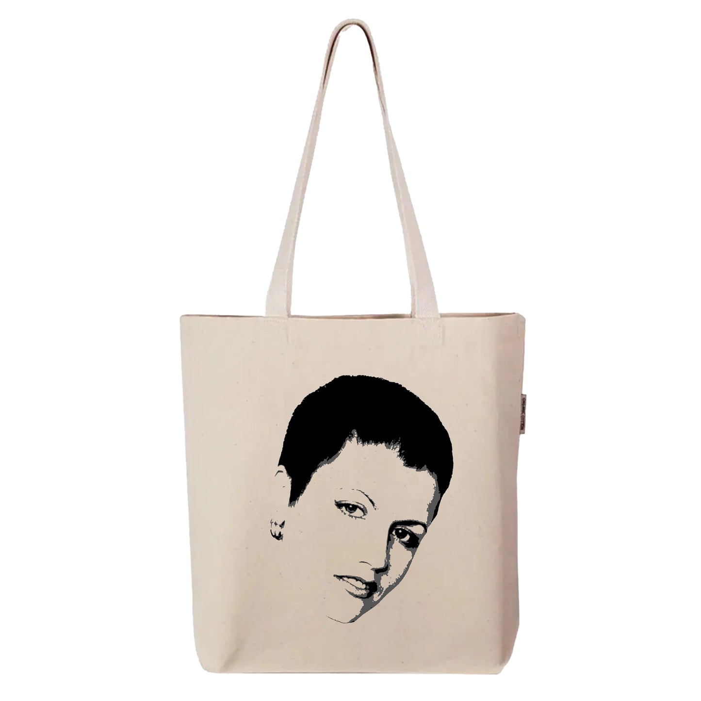 FYRNE Dolores O’Riordan tote bag — canvas accessory featuring minimalist portrait artwork inspired by the iconic voice of Ireland, perfect for music lovers and heritage design fans.