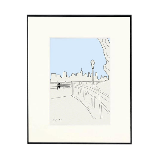 A hand drawn print of the Brooklyn Heights Promenade with the New York skyline in the distance. Framed, signed and printed on textured paper. 
