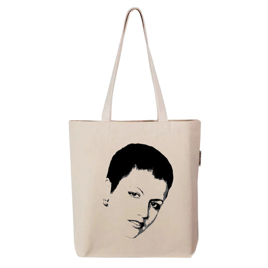 FYRNE Dolores O’Riordan tote bag — canvas accessory featuring minimalist portrait artwork inspired by the iconic voice of Ireland, perfect for music lovers and heritage design fans.